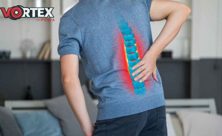 This image showing a person with back pain.