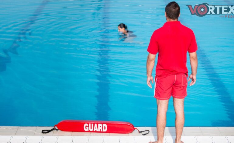 This picture shows that a lifeguard coach is provide class for students.