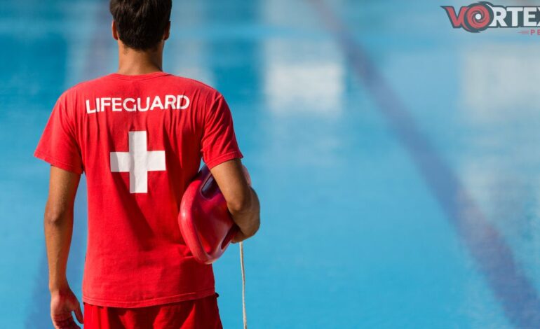 This image shows a man waiting for the life guard class with blue and red background.