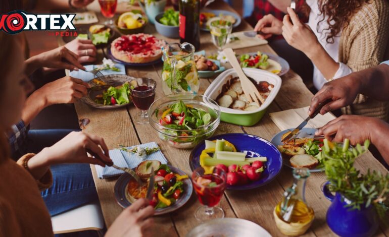 The Dishes with food Lying on the table.