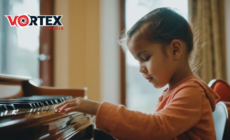 A little girl playing a piano in a room.