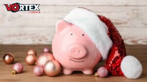 a piggy bank wearing a Santa hat.