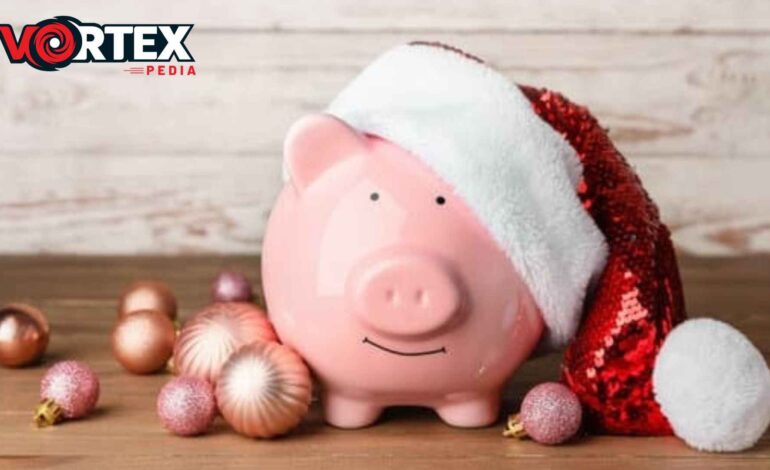 a piggy bank wearing a Santa hat.