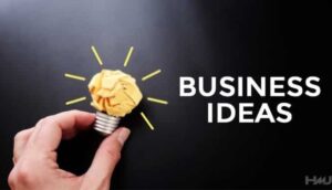 This image showing hand holding a lightbulb with a crumpled paper bulb, yellow lines, and text "BUSINESS IDEAS".